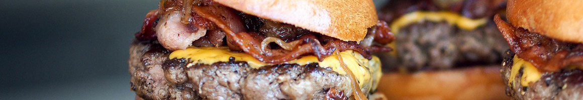Eating Burger at Ron's Hamburgers & Chili restaurant in Bentonville, AR.